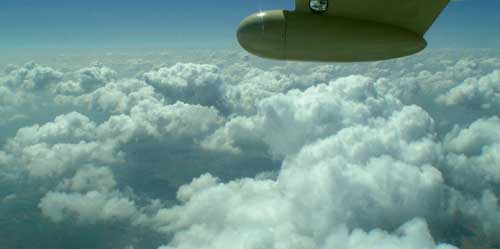 Over the clouds heading for the weather front