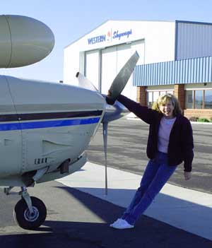 Joan preflighting our plane